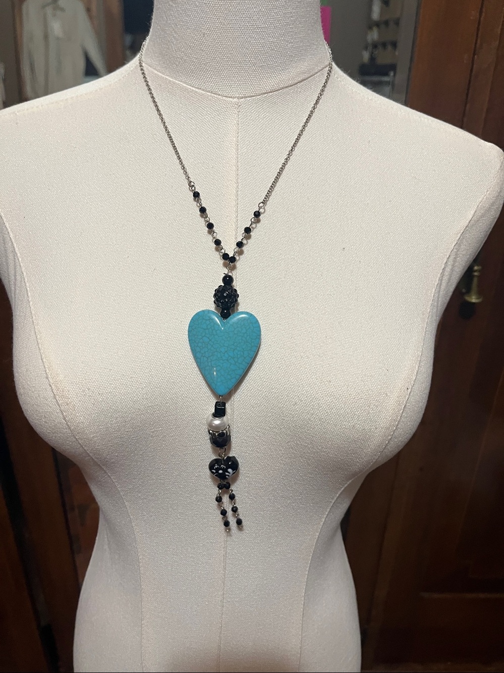 Boho Heart necklace blue handcrafted with black beads. 3283.